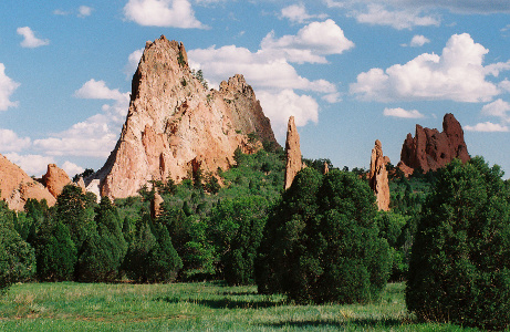 [Thin sheets of rock set on the landscape.]